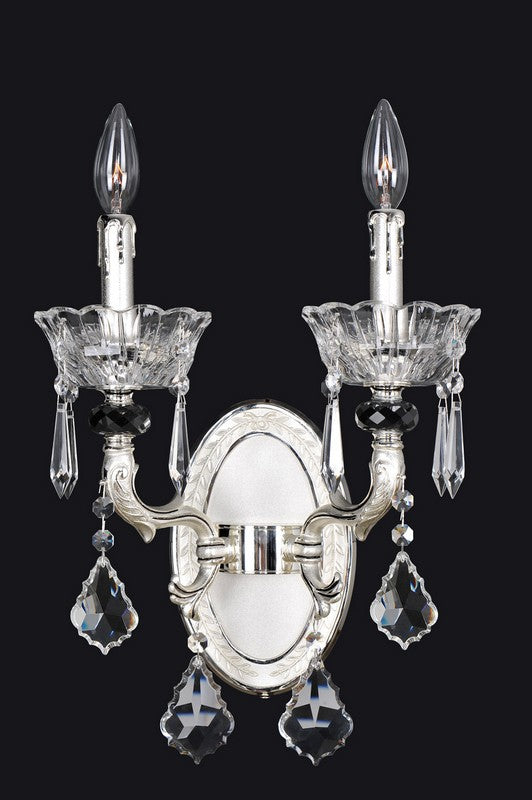 6 Light Round Pendant/Flush Mount. The Donizetti Collection pairs modern style with acanthus details, a shapely stem, and curves in Two-tone Silver, topped with candle bobeches and draped Firenze crystals.