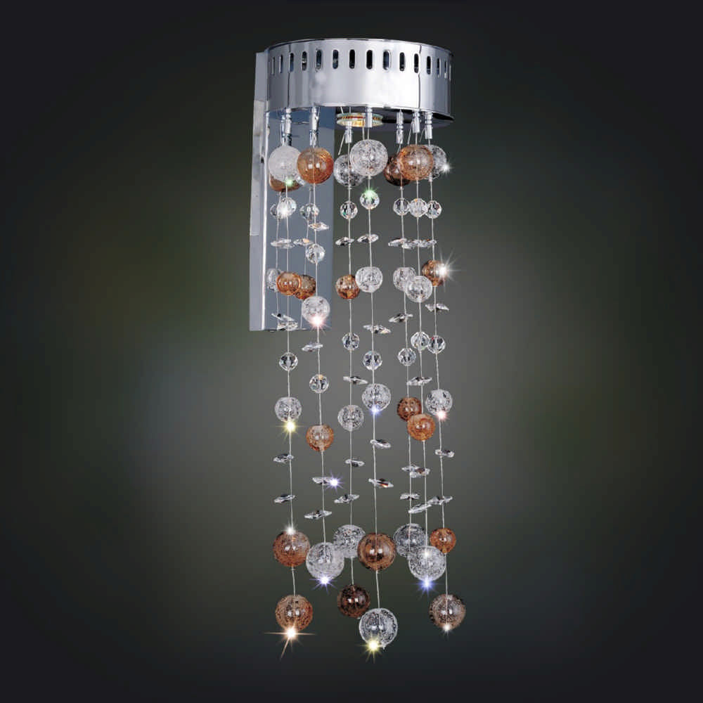 2.21 Light Chandelier. The Fanshawe Collection fuses Art Deco and Venetian artistry with hand-blown glass arms, conical glass columns, and Clear Firenze crystals. A Chrome finish fades away, letting the crystal shine.